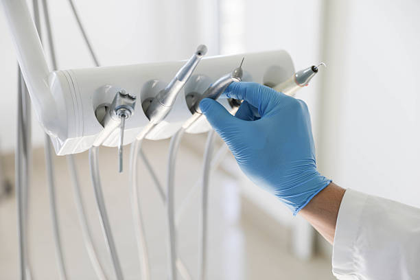 Professional Tooth Extraction technician working in Pitt County County, NC